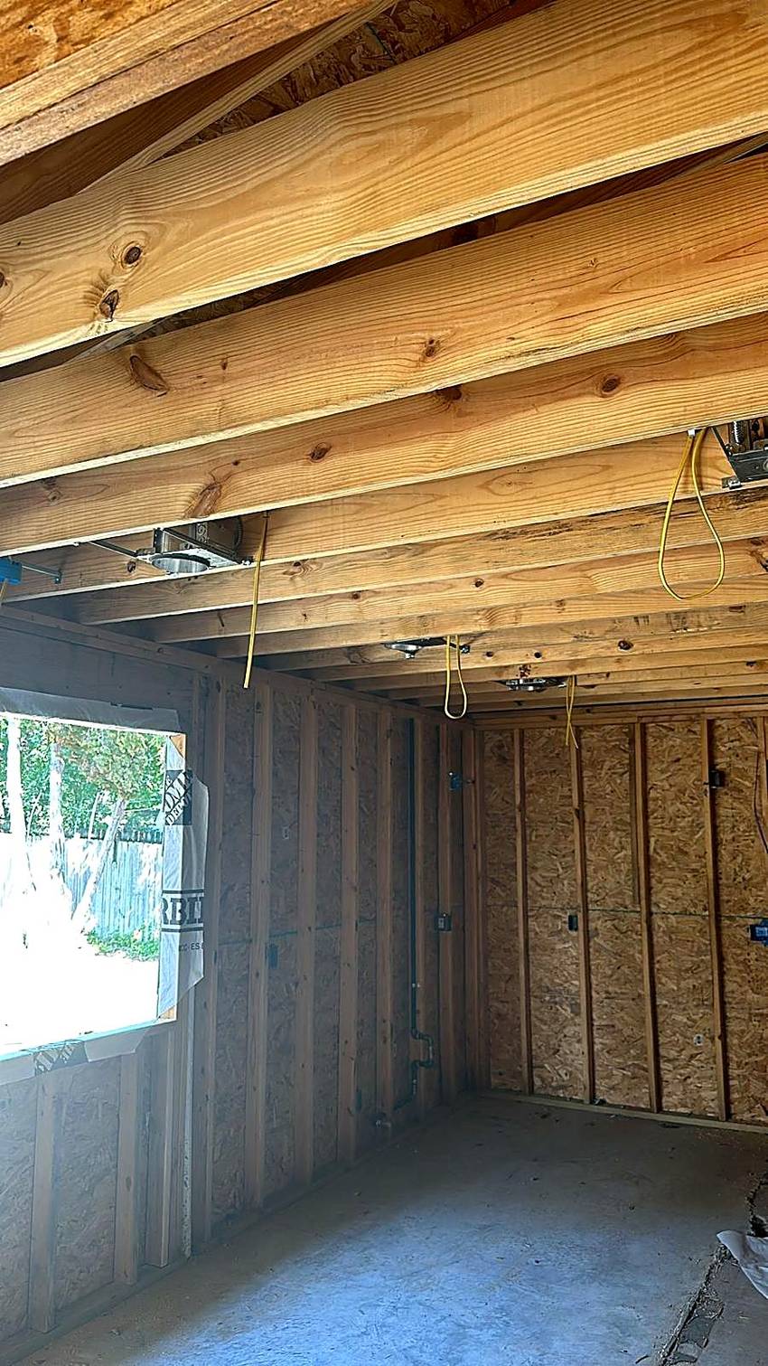 Addition interior framed and sheathed, with rough electrical run to every box, Austin, TX